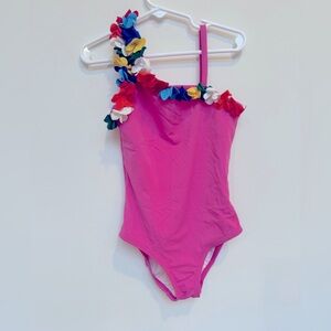 Hanna Anderson Swim. Girls pink asymmetrical one piece. Size 6-7.